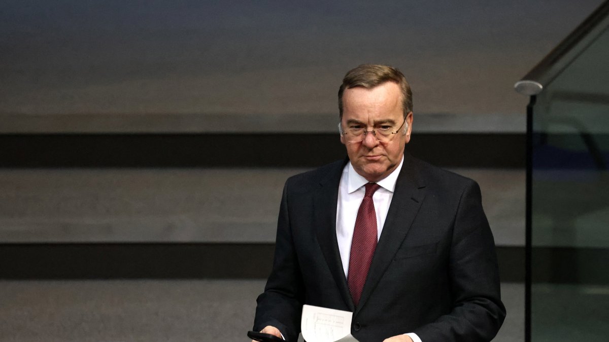 German Defense Minister Boris Pistorius walks in the lower house of parliament Bundestag during a debate in Berlin, Germany, March 4, 2026. (Reuters Photo)