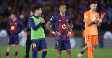 Barcelona players react at the end of the Copa del Rey semifinal second leg football match against Atletico de Madrid at Camp Nou Stadium, Barcelona, Spain, March 3, 2026. (AFP Photo)