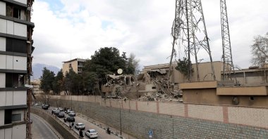 A view of the damage seen from the Gandi Hospital when a projectile struck a state TV communications tower and nearby buildings, during the ongoing joint U.S.-Israeli military campaign on Tehran, Iran, March 2, 2026. (AFP Photo)