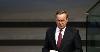 German Defense Minister Boris Pistorius walks in the lower house of parliament Bundestag during a debate in Berlin, Germany, March 4, 2026. (Reuters Photo)