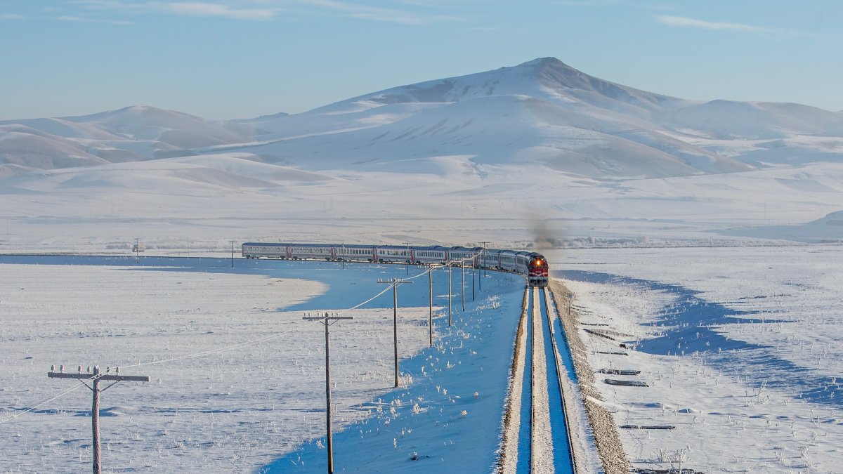 The Tourist Eastern Express travels through a scenic winter landscape, Kars, Türkiye, Nov. 30, 2024. (Shutterstock Photo)