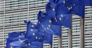 European Union flags flutter outside the EU Commission headquarters, Brussels, Belgium, July 16, 2025. (Reuters Photo)