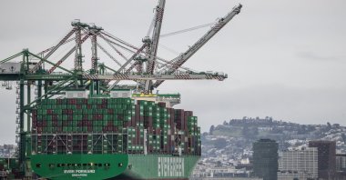 Shipping containers are stacked on a cargo ship following the Supreme Court's ruling that Trump had exceeded his authority when he imposed tariffs, port of Oakland, California, U.S., Feb. 24, 2026. (Reuters Photo)