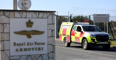A car drives out of the entrance of RAF Akrotiri, a British sovereign base, as the conflict in the Middle East intensifies, Greek Cypriot administration, March 5, 2026. (Reuters Photo)
