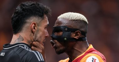 Galatasaray's Victor Osimhen confronts Beşiktaş's Emirhan Topçu during the Süper Lig match at RAMS Park Stadium, Istanbul, Türkiye, Oct. 4, 2025. (Getty Images Photo)