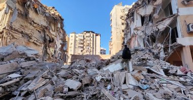 A man stands near the rubble of a building damaged in an Israeli strike on southern Beirut, Lebanon, March 5, 2026. (Reuters Photo)