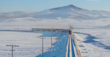 The Tourist Eastern Express travels through a scenic winter landscape, Kars, Türkiye, Nov. 30, 2024. (Shutterstock Photo)