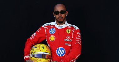 Ferrari driver Lewis Hamilton poses during a photoshoot ahead of the Australian Grand Prix at Albert Park Grand Prix Circuit, Melbourne, Australia, March 5, 2026. (Reuters Photo)
