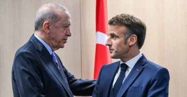 President Recep Tayyip Erdoğan shakes hands with French President Emmanuel Macron, The Hague, Netherlands, June 25, 2025. (AA File Photo)