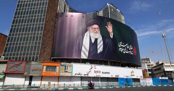 A billboard with a picture of Iran's late Supreme Leader Ayatollah Ali Khamenei is seen installed on a building at Valiasr Square, Tehran, Iran, March 5, 2026. (AFP Photo)