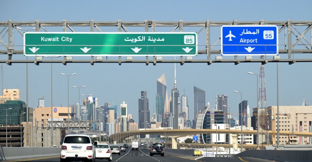 Vehicles drive along the highway leading to and from Kuwait City, March 2, 2026. (AFP Photo)
