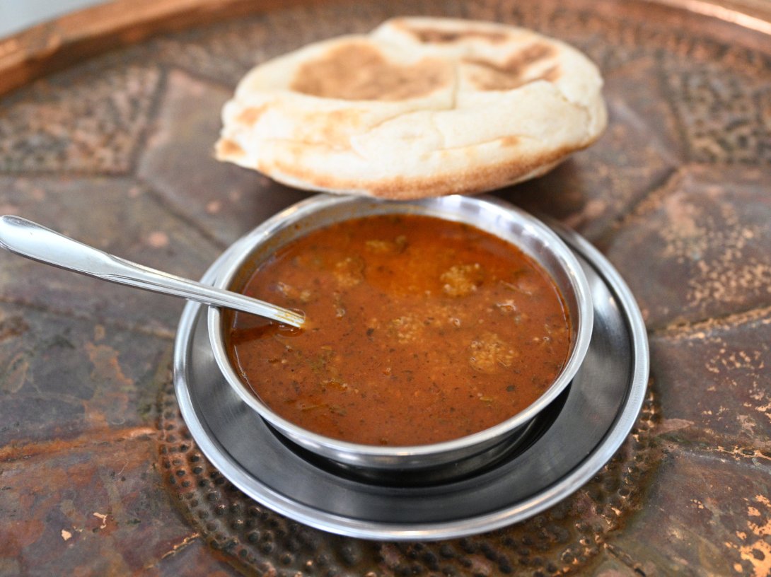 A bowl of traditional Turkish wedding soup is served with bread in Kayseri, central Türkiye, Dec. 12, 2025. (AA Photo)