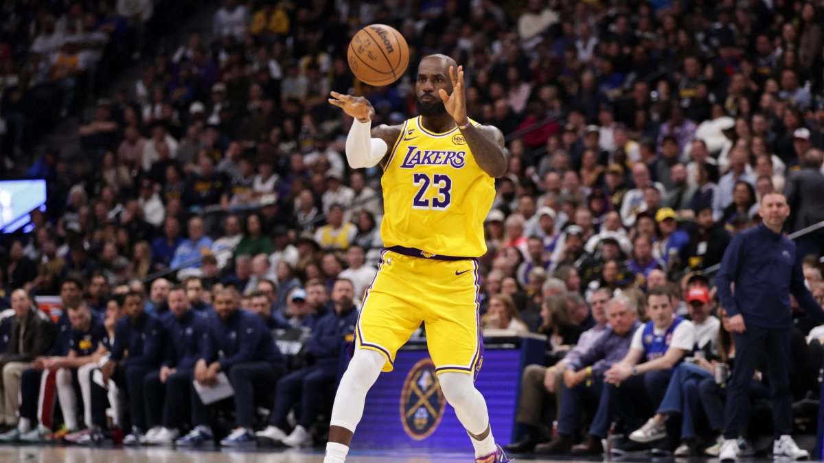 Los Angeles Lakers' LeBron James passes the ball during the second quarter against the Denver Nuggets at Ball Arena, Denver, U.S., Mar. 5, 2026. (AFP Photo)