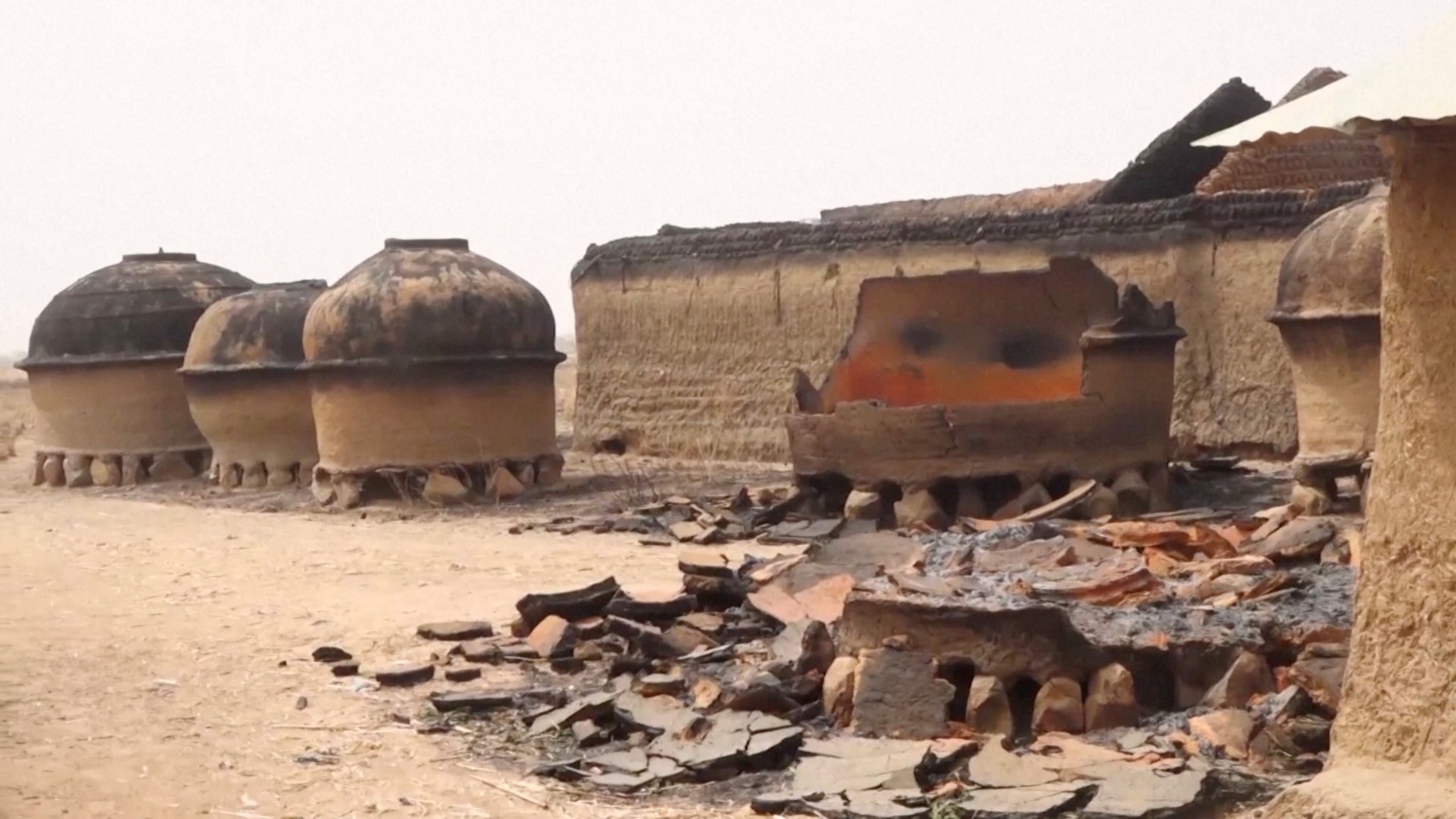 Burnt and damaged properties after multiple people were killed and several women and children were abducted following an attack by armed men in Dutsin Dan Ajiya village in Anka Local Government Area of Zamfara State, Nigeria, Feb. 21, 2026. (Reuters File Photo)