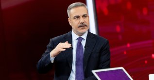 Foreign Minister Hakan Fidan speaks on a live broadcast, March 3, 2026. (AA Photo)