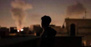 A plume of smoke rises after a strike on Tehran, March 4, 2026. (AFP Photo)