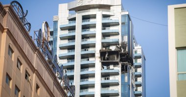 Damaged buildings are seen after a kamikaze drone launched as part of Iran’s retaliatory strikes, Manama, Bahrain, March 1, 2026. (AA Photo)