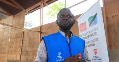 Arafat Magaula distributes aid to local communities as a volunteer for the Türkiye Diyanet Foundation, Dar es Salaam, Tanzania, March 5, 2026. (AA Photo)