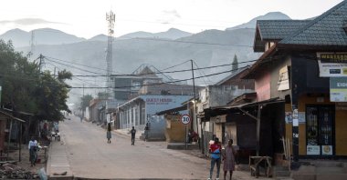 Congolese civilians walk after returning to their homes following displacement during renewed clashes between Alliance Fleuve Congo AFC/M23 and the Armed Forces of the Democratic Republic of the Congo (FARDC), Uvira town, DRC, Dec. 13, 2025. (Reuters Photo)