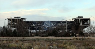 A photograph shows a heavily damaged building at Tehran's Azadi Sport Complex following a strike, March 5, 2026. (AFP Photo)