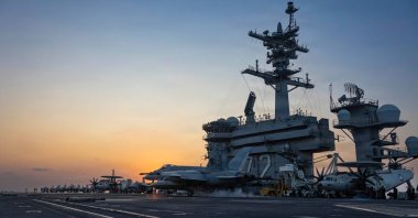 An F/A-18E Super Hornet, attached to Strike Fighter Squadron (VFA) 14, makes an arrested landing on the flight deck of Nimitz-class aircraft carrier USS Abraham Lincoln (CVN 72) in support of "Operation Epic Fury", March 4, 2026. (U.S. Centcom via AFP)