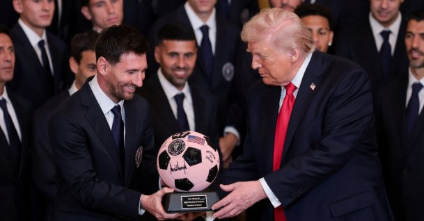 U.S. President Donald Trump (R) is gifted a jewelled football ball with his signature on it from Inter Miami CF captain Lionel Messi, on the day he honors reigning Major League Soccer (MLS) champion Inter Miami CF players and team officials with an event in the East Room of the White House, Washington, U.S., March 5, 2026. (Reuters Photo)
