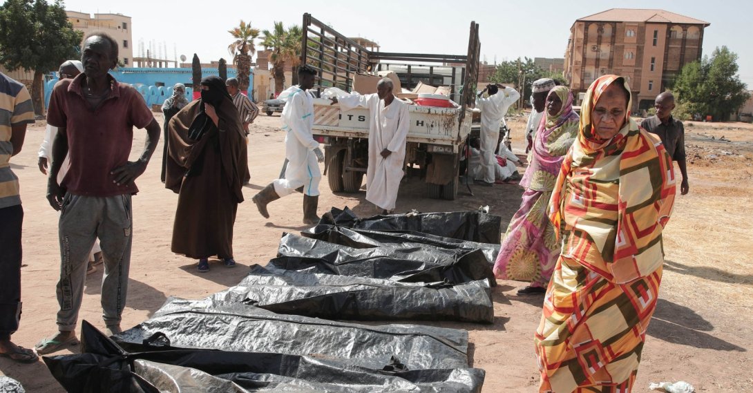 Relatives check the body bags of victims of Sudan’s two-year conflict after the Sudanese Red Crescent transferred the remains from makeshift graves to a local cemetery, Khartoum, Sudan, Jan. 11, 2026. (AP Photo)