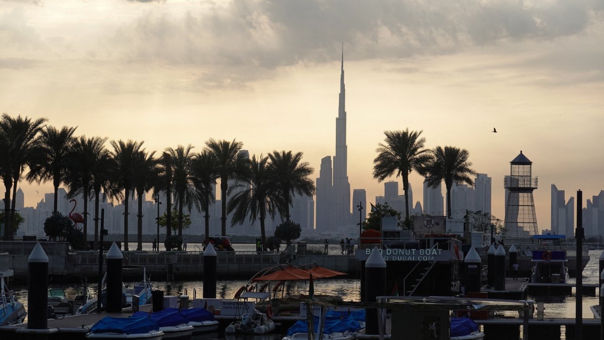 Boats are docked at Dubai Creek Harbour as the Dubai skyline, including the Burj Khalifa, is seen in the background amid the U.S.-Israel conflict with Iran, in Dubai, United Arab Emirates, March 6, 2026. (Reuters Photo)