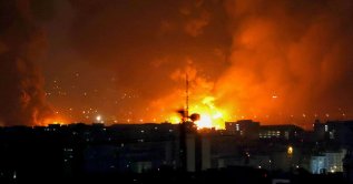 Smoke and fire rise from the site of airstrikes at Mehrabad International Airport in Tehran, Iran, March 7, 2026. (AFP Photo)