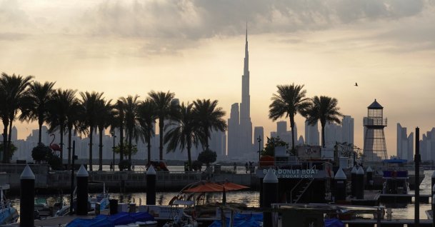 Boats are docked at Dubai Creek Harbour as the Dubai skyline, including the Burj Khalifa, is seen in the background amid the U.S.-Israel conflict with Iran, in Dubai, United Arab Emirates, March 6, 2026. (Reuters Photo)