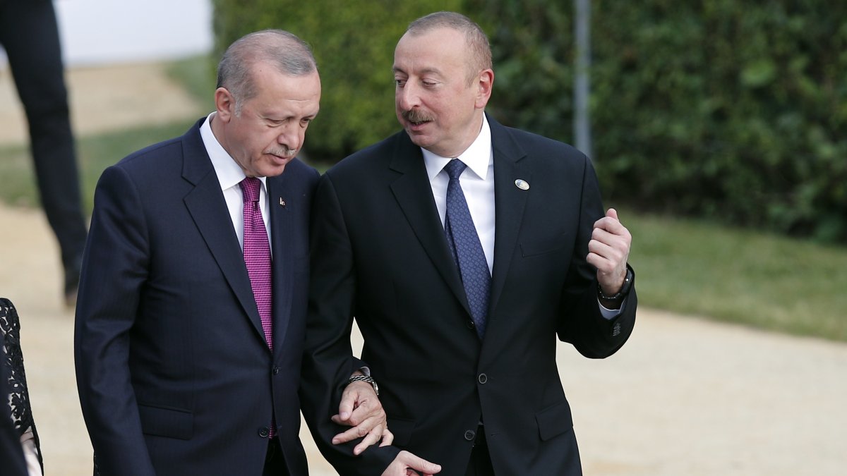 President Recep Tayyip Erdoğan listens to Azerbaijani President Ilham Aliyev (R) during a summit of heads of state and government at NATO headquarters, Brussels, Belgium, July 11, 2018. (AP Photo)