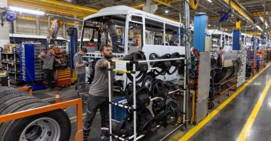 Technicians work on a bus at a production line of Türkiye's heavy commercial and armored vehicle manufacturer Otokar factory, Sakarya, northwestern Türkiye, July 13, 2023. (Reuters Photo)