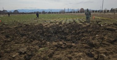 This photo taken with a mobile phone shows a crater caused by a drone strike near a school in Nakhchivan Autonomous Republic, March 5, 2026. (DHA Photo)