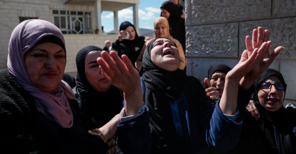 Mourners react during the funeral of three Palestinians who were killed in an Israeli settler attack, in the village of Abu Falah near Ramallah, in the Israeli-occupied West Bank, March 8, 2026. (Reuters Photo)