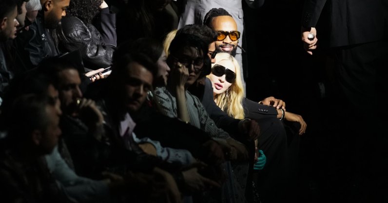 Madonna attends the Dolce &amp; Gabbana Fall/Winter 2026-2027 Women's collection, presented in Milan, Italy, Feb. 28, 2026. (AP Photo)