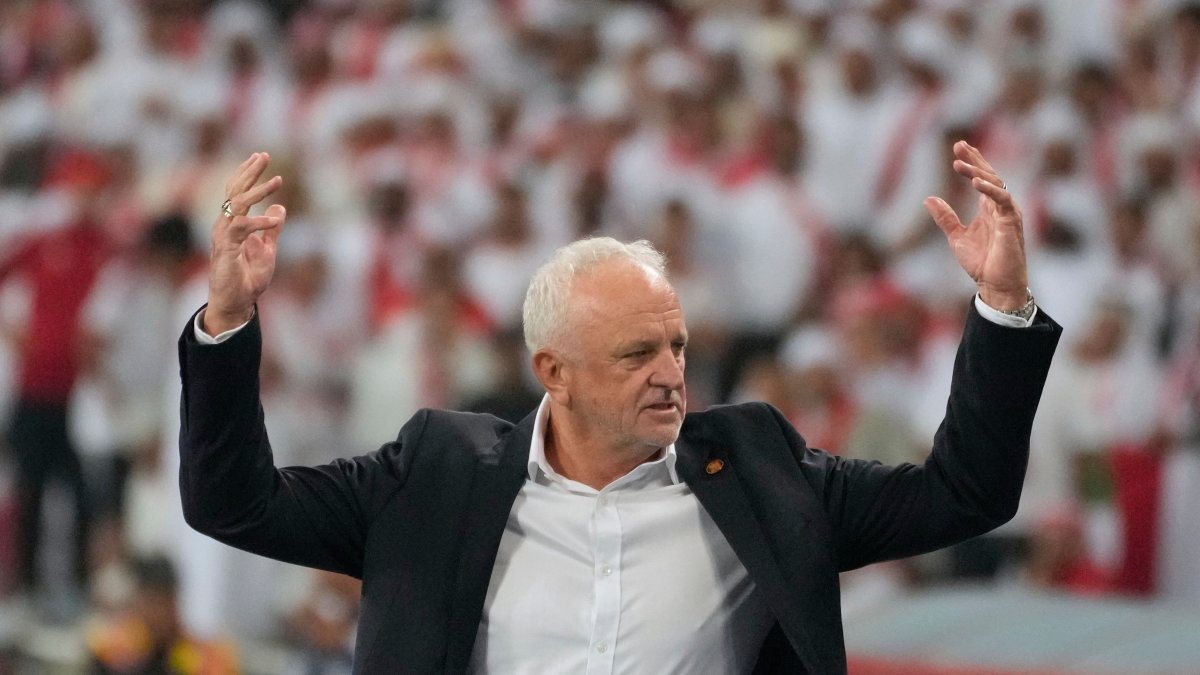 Iraq's head coach Graham Arnold celebrates his team's win during the 2026 World Cup playoff second-leg match between the UAE and Iraq, Basra, Iraq, Nov. 18, 2025. (AP Photo)