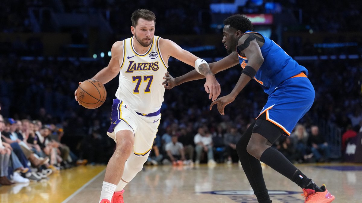 Los Angeles Lakers guard Luka Doncic (L) dribbles against New York Knicks forward Mohamed Diawara during the second half at Crypto.com Arena, Los Angeles, U.S., March 8, 2026. (Reuters Photo)
