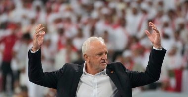 Iraq's head coach Graham Arnold celebrates his team's win during the 2026 World Cup playoff second-leg match between the UAE and Iraq, Basra, Iraq, Nov. 18, 2025. (AP Photo)