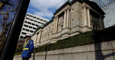 A security guard stands in front of the Bank of Japan headquarters, Tokyo, Japan, Dec. 19, 2025. (Reuters Photo)