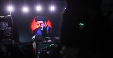 A picture of Iran's new supreme leader, Mojtaba Khamenei, is displayed on a screen in Tehran, Iran, March 9, 2026. (Reuters Photo)