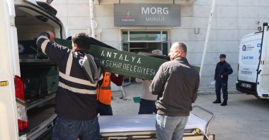 Officials transport the bodies of irregular migrants from the morgue at Finike State Hospital in Antalya, Türkiye, March 9, 2026. (AA Photo)