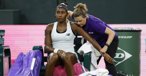 U.S' Coco Gauff receives physio treatment before retiring from her women’s singles match against the Philippines' Alexandra Eala on day 5 of the BNP Paribas Open tennis tournament, Indian Wells, U.S., March 8, 2026. (EPA Photo)
