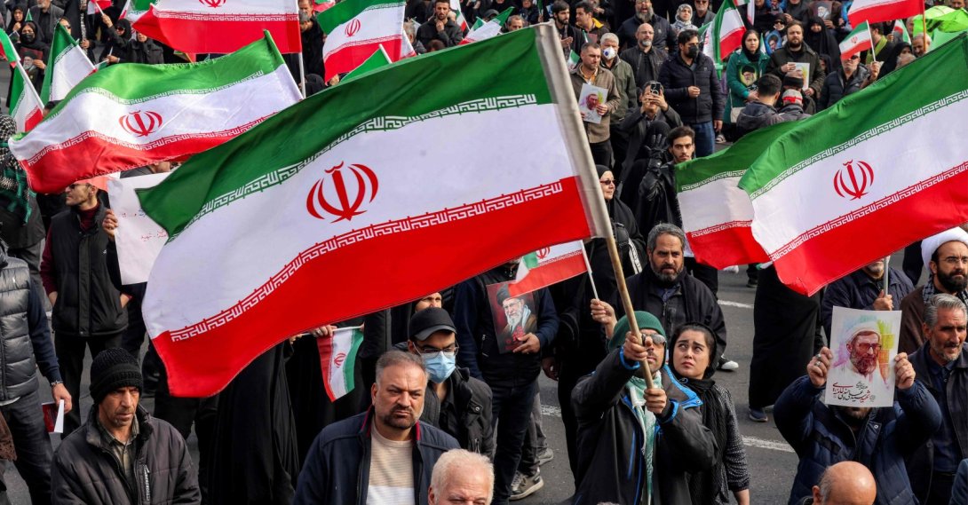 People with Iranian national flags rally in support of the new supreme leader in central Tehran, Iran, March 9, 2026. (AFP Photo)