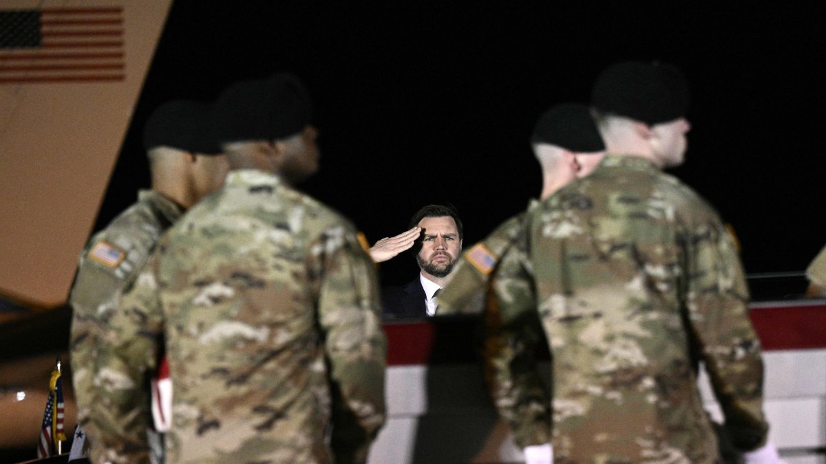 U.S. Vice President JD Vance salutes as members of a U.S. Army team carry a flag-draped transfer case containing the remains of Sgt. Benjamin N. Pennington, 26, Dover Air Force Base, Dover, Delaware, U.S., March 9, 2026. (AFP Photo)