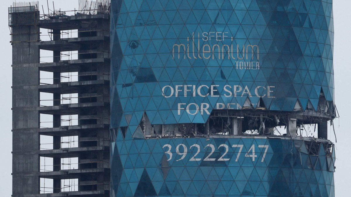 A building damaged in a reported Iranian drone strike, amid the U.S.-Israeli conflict with Iran, in Seef, Manama, Bahrain, March 10, 2026. (Reuters Photo)