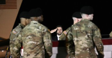 U.S. Vice President JD Vance salutes as members of a U.S. Army team carry a flag-draped transfer case containing the remains of Sgt. Benjamin N. Pennington, 26, Dover Air Force Base, Dover, Delaware, U.S., March 9, 2026. (AFP Photo)
