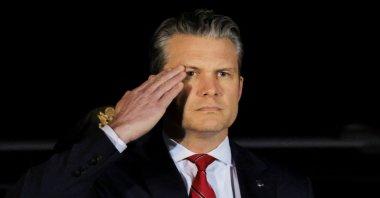 Secretary of Defense Pete Hegseth salutes during a dignified transfer of the remains of a U.S. troop in Dover, Delaware, U.S., March 9, 2026. (Reuters Photo)