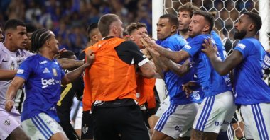 Cruzeiro and Atletico Mineiro players fight during the Minas Gerais state title match at the Mineirao, Belo Horizonte, Brazil, March , 2026. (AP Photo)