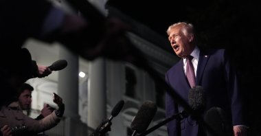 President Donald Trump talks to the media as he walks to Marine One from the White House, Friday, Dec. 19, 2025, in Washington. (AP File Photo)
