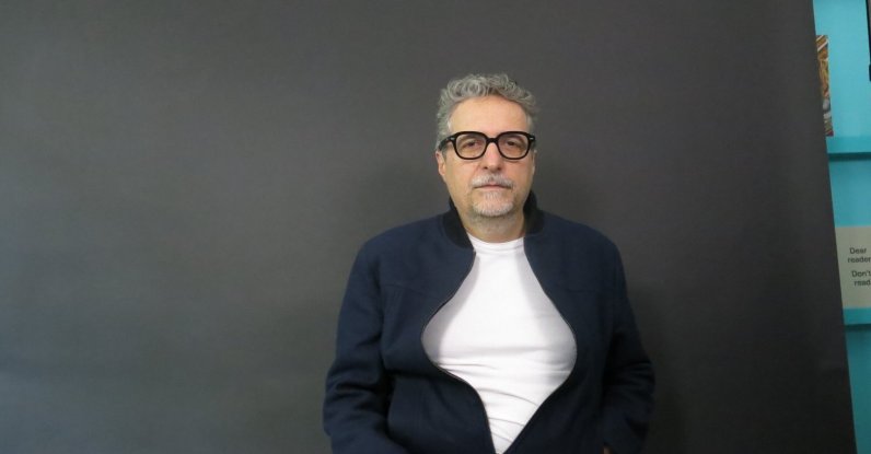 Brazilian filmmaker Kleber Mendonça Filho, director of the Oscar nominated film "The Secret Agent," poses for a portrait in Mexico City, Dec. 9, 2025. (AP Photo)